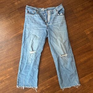 Levi's High Rise Light Blue Distressed Jeans